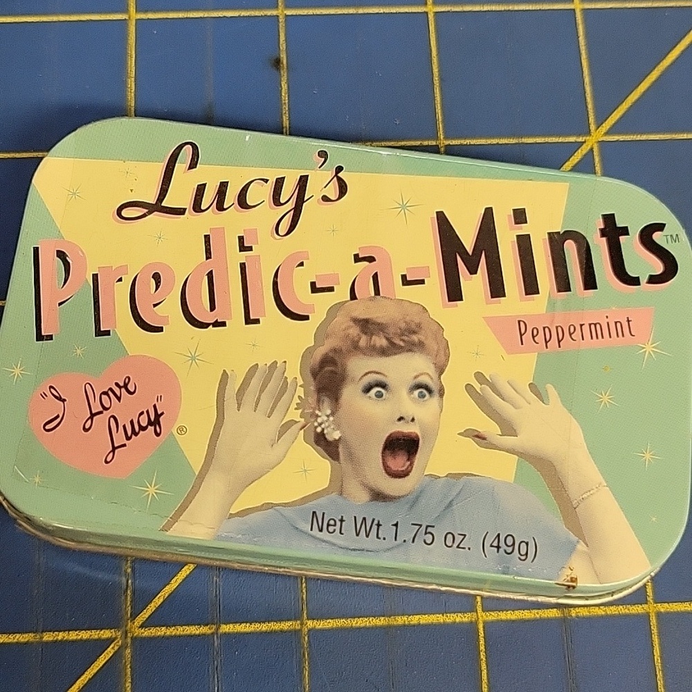 Lucy's Predic-a-Mints Metal Hinged Box sealed with mints